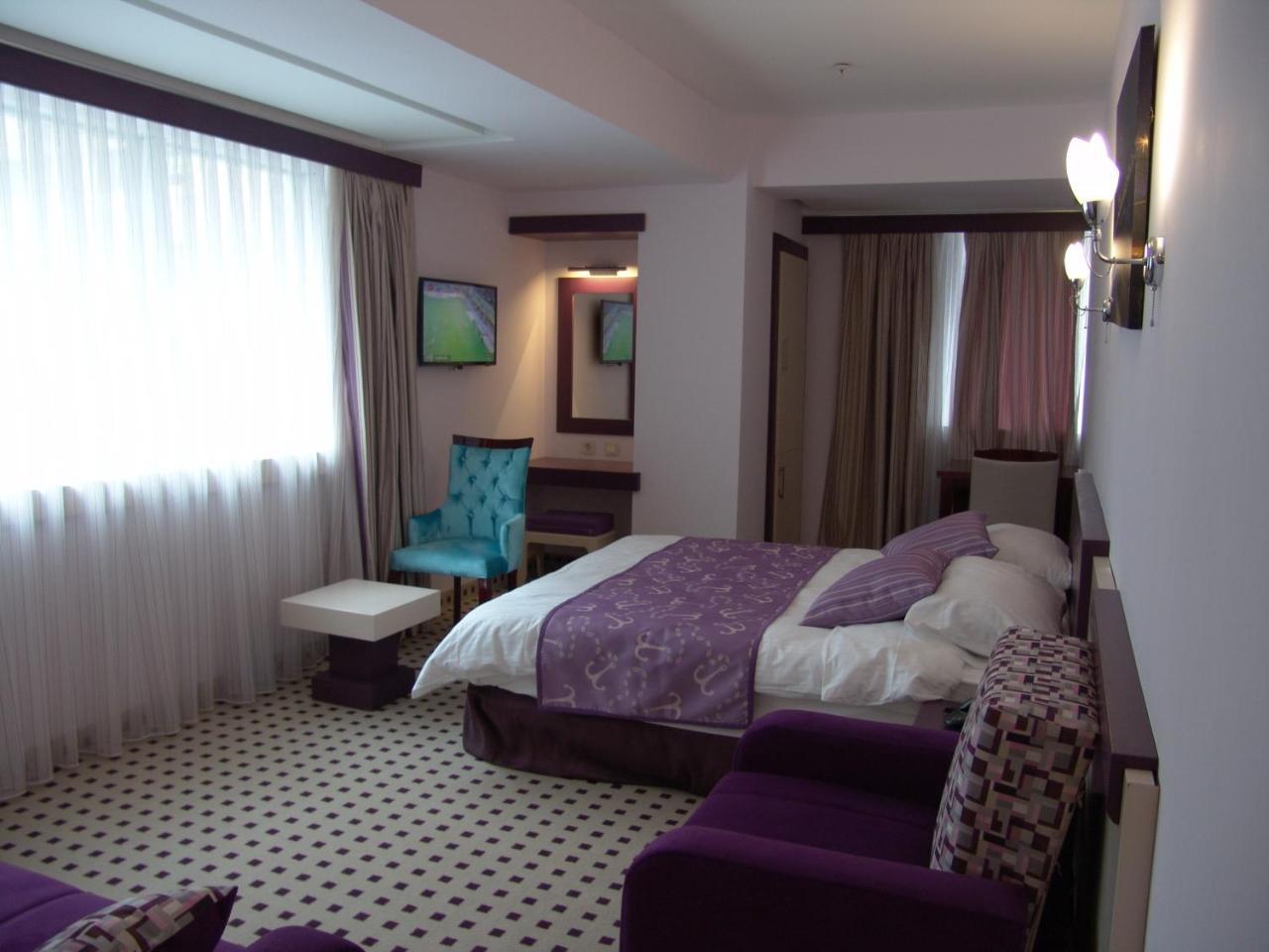 Izan Hotel Измир Стая снимка